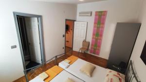 Postel nebo postele na pokoji v ubytování Apartments Veronika