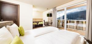 Postel nebo postele na pokoji v ubytování Aktiv Hotel Edelweiss