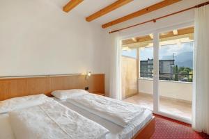Posteľ alebo postele v izbe v ubytovaní Weinsepphof Ferienwohnung 7