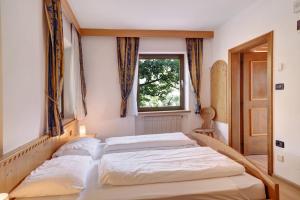 Ένα ή περισσότερα κρεβάτια σε δωμάτιο στο Weinsepphof Ferienwohnung 1 +14 φωτογραφίες