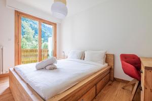 Katil atau katil-katil dalam bilik di Au Cœur du Glacier