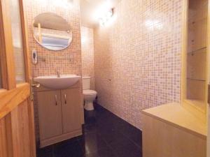 a small bathroom with a sink and a toilet at Luna 218 flat 3 at Marble Arch in London