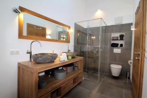 Koupelna v ubytování Alpenloft by Apartment Managers + 17 fotografií