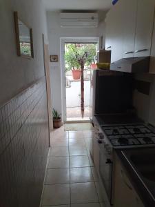 Kuchyň nebo kuchyňský kout v ubytování Apartments Jerković Drašnice-2bd