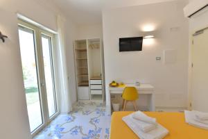 Postel nebo postele na pokoji v ubytování Acquadamare B&B