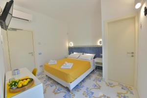Postel nebo postele na pokoji v ubytování Acquadamare B&B