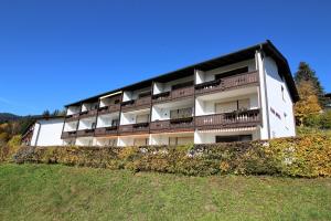 an apartment building with balconies on a hill at Apartment Weinberg by Apartment Managers in Kirchberg in Tirol