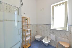Koupelna v ubytování Acquadamare B&B