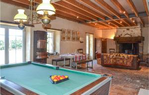 a large room with a pool table in it at Gorgeous Home In Domfront En Champagne With Kitchen in Domfront-en-Champagne