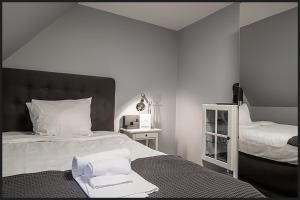 Letto o letti in una camera di Continental Apartment Hotel Helsingborg