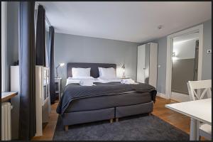 Letto o letti in una camera di Continental Apartment Hotel Helsingborg