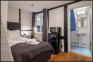 Letto o letti in una camera di Continental Apartment Hotel Helsingborg