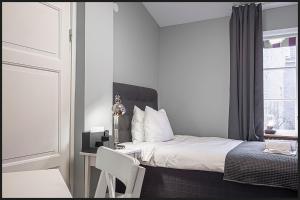 Letto o letti in una camera di Continental Apartment Hotel Helsingborg