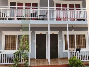 Balkón nebo terasa v ubytování Sea Shell Beach Cottages & Suites