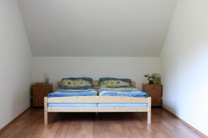 En eller flere senge i et værelse på Apartmán Meduňková