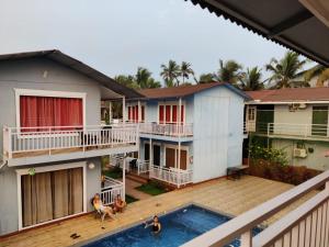 Balkón nebo terasa v ubytování Sea Shell Beach Cottages & Suites