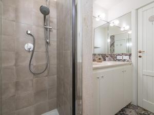 a bathroom with a shower and a sink at Marco's stylish home In the heart of Cagliari in Cagliari
