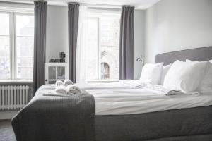 Letto o letti in una camera di Continental Apartment Hotel Helsingborg