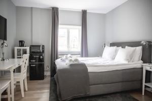 Postel nebo postele na pokoji v ubytování Continental Apartment Hotel Helsingborg