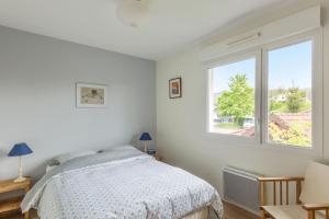 Krevet ili kreveti u jedinici u objektu 3-rooms flat in Annecy in the lovely Seynod village