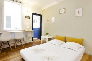 Un ou plusieurs lits dans un hébergement de l'établissement Charming flat in the heart of the old Bayonne