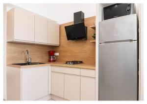 Kuchyň nebo kuchyňský kout v ubytování Apartment Jerko 2 + 24 fotografií