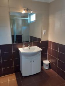 Koupelna v ubytování Aroma Apartman