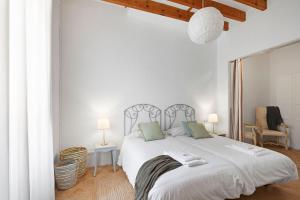 Postel nebo postele na pokoji v ubytování Villa Santanyí, Sueño de Verano