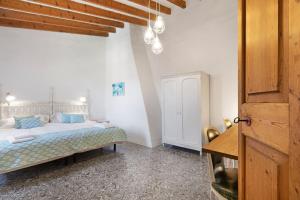 Postel nebo postele na pokoji v ubytování Villa Santanyí, Sueño de Verano
