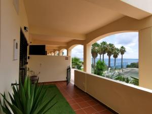 a balcony with a view of the ocean at Lagos Sea View Apartment in Lagos