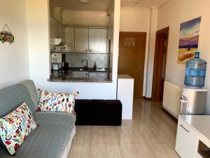 Кухня или мини-кухня в Apartamentos en Playa de Samil Primera Línea de playa Pe Na Areia
