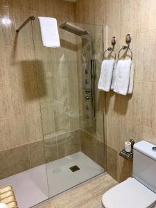 Ванная комната в Apartamentos en Playa de Samil Primera Línea de playa Pe Na Areia