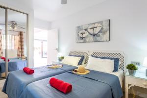 Tenerife South Apartments客房内的一张或多张床位
