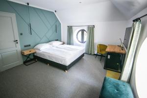 Postel nebo postele na pokoji v ubytování Hotel Gabriella