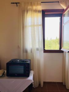 Postel nebo postele na pokoji v ubytování Serenita Cottage