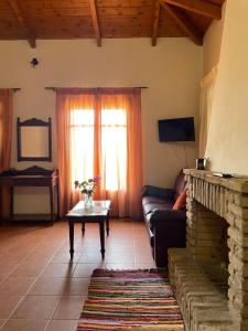 TV a/nebo společenská místnost v ubytování Serenita Cottage