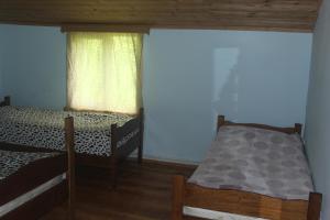 Voodi või voodid majutusasutuse Guesthouse Daeli toas