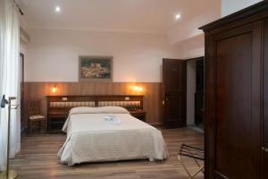 Łóżko lub łóżka w pokoju w obiekcie Hotel Tonic