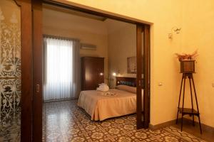 Łóżko lub łóżka w pokoju w obiekcie Hotel Tonic