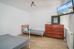 Postel nebo postele na pokoji v ubytování Apartman Sidonija