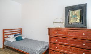 Postel nebo postele na pokoji v ubytování Apartman Sidonija