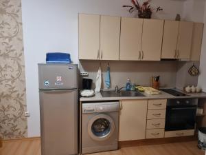 A kitchen or kitchenette at Sunny Day 6