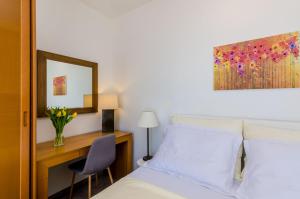Posteľ alebo postele v izbe v ubytovaní Apartments Knego