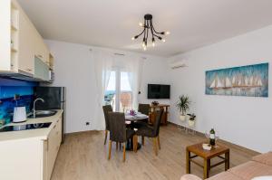 Kuchyňa alebo kuchynka v ubytovaní Apartments Knego