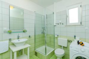 Kúpeľňa v ubytovaní Apartments Knego
