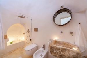 Uma casa de banho em Trulli 18cinquantanove