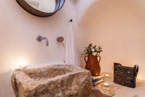 Uma cama ou camas num quarto em Trulli 18cinquantanove