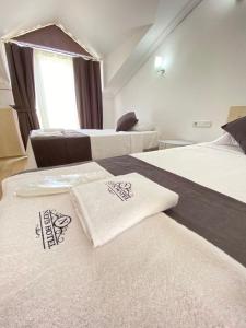 Postel nebo postele na pokoji v ubytování Nefis Hotel Ölüdeniz