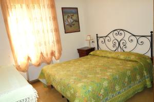 A bed or beds in a room at Hotel Roma