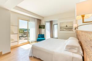 Letto o letti in una camera di Hotel Laurin